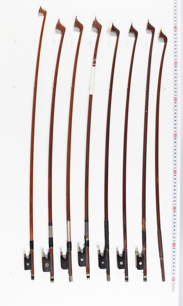 One violin bow, six cello bows and one bow sticks, varying lengths