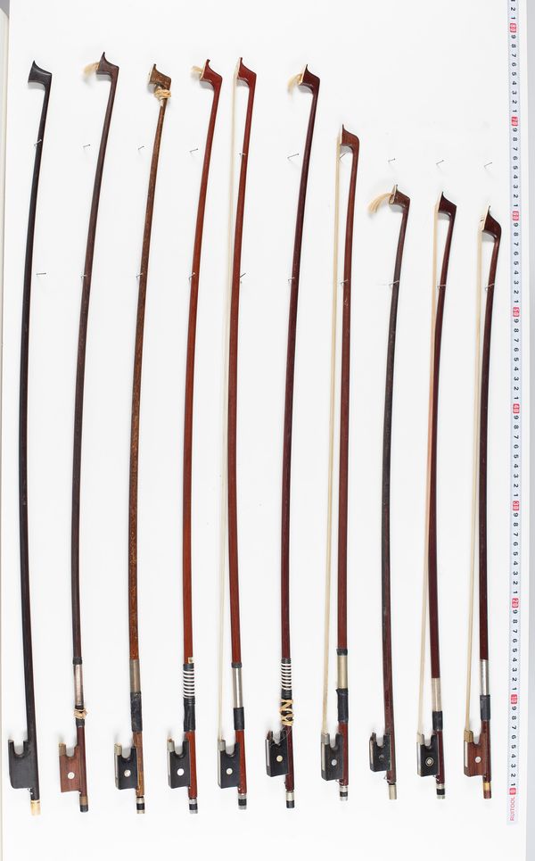 Ten violin bows, varying lengths