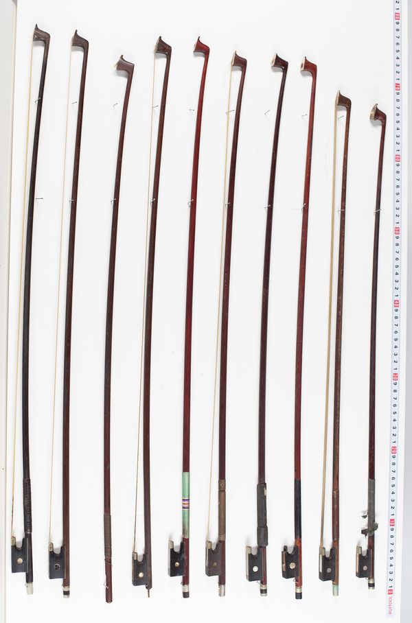 Seventeen violin bows and one bow sticks, varying lengths