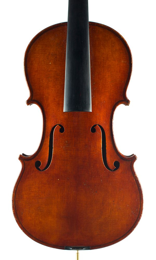 A violin, branded VP on top-block