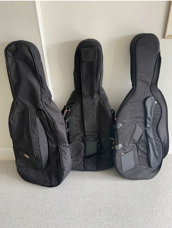Three full size cello cases