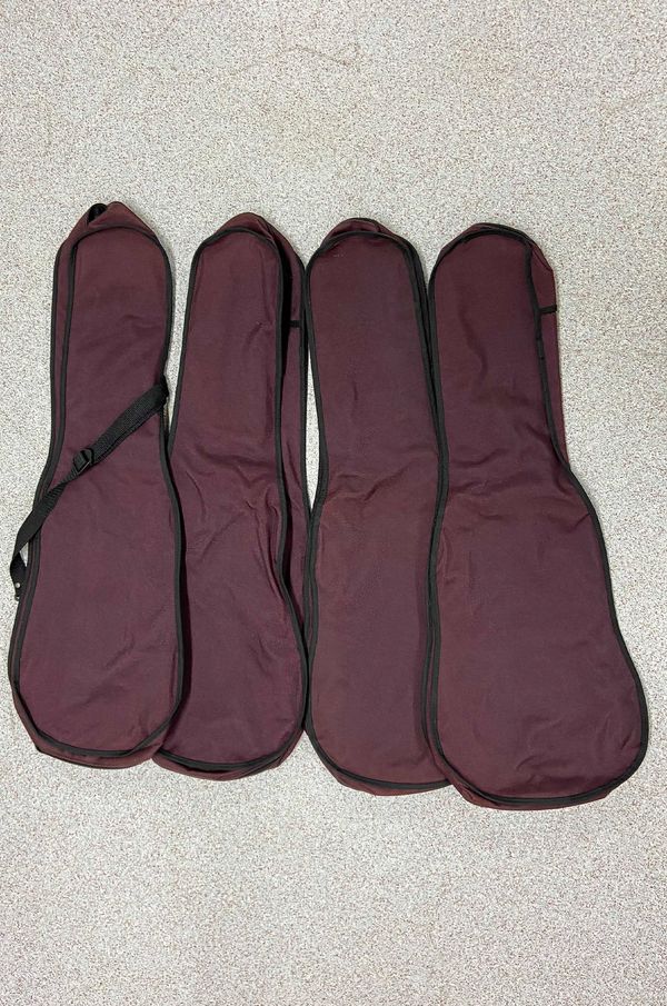 Five burgundy violin case covers
