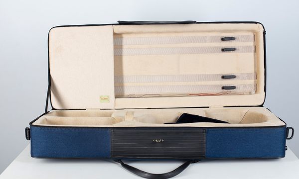 A violin case, branded Bam