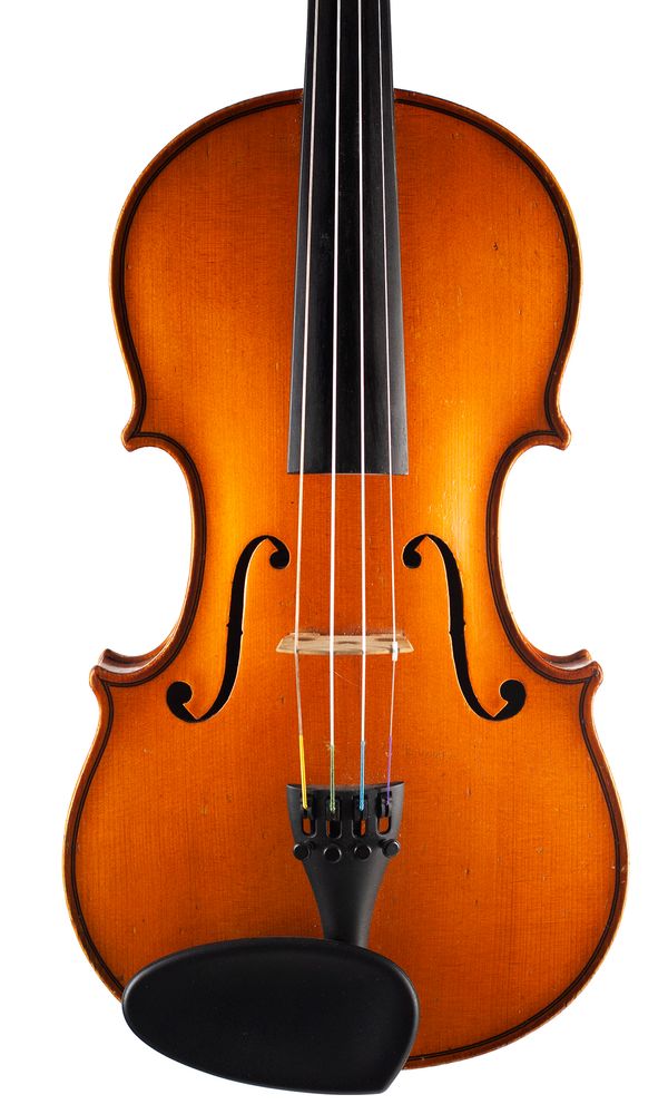 A violin, labelled Hawkes and Son