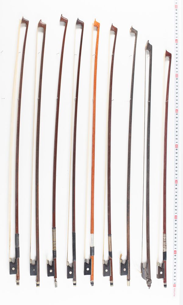 Nine violin bows, varying lengths