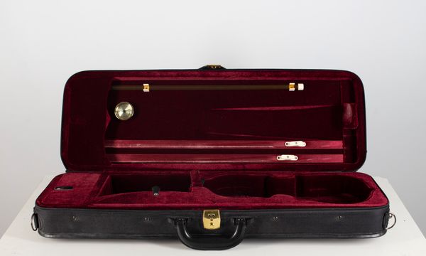 A violin case, branded JTL
