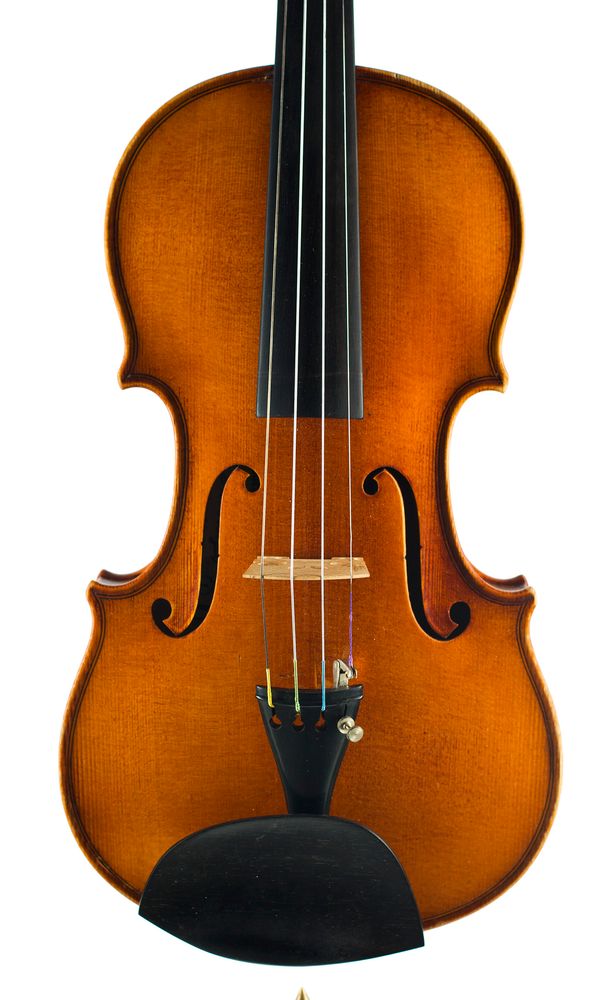 A violin, labelled Theodor Berger