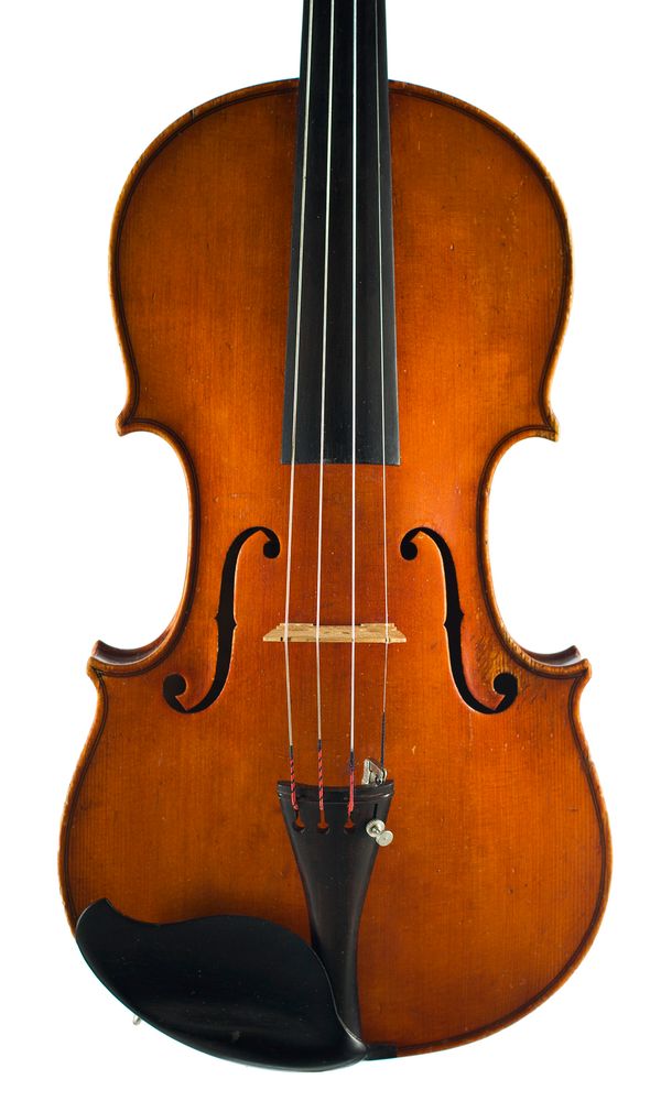 A violin, labelled Schuster and Co