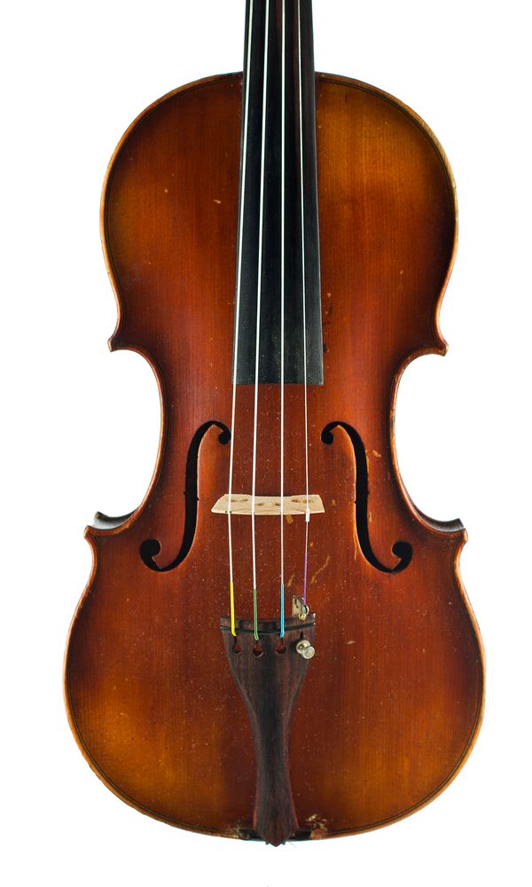 A violin, labelled Fait sous la direction de Louis Chepitel