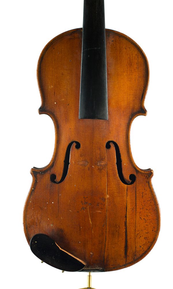 A half-sized violin, labelled Antonius Stradiuarius