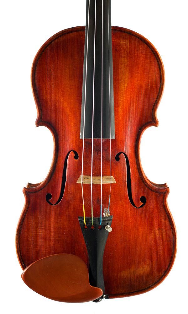 A violin, labelled Joannes Fransiscus Pressenda
