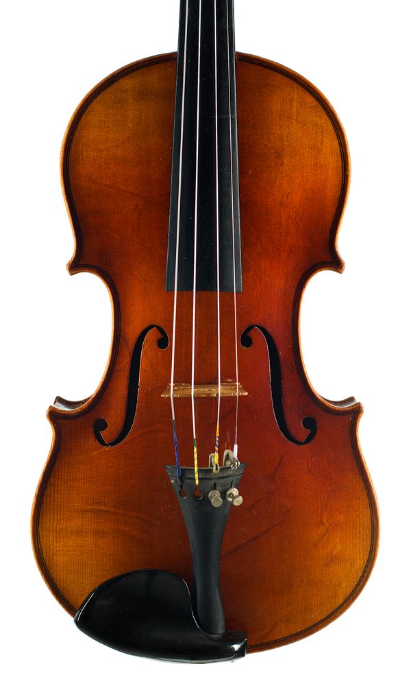 A violin, labelled Carlo Bergonzi