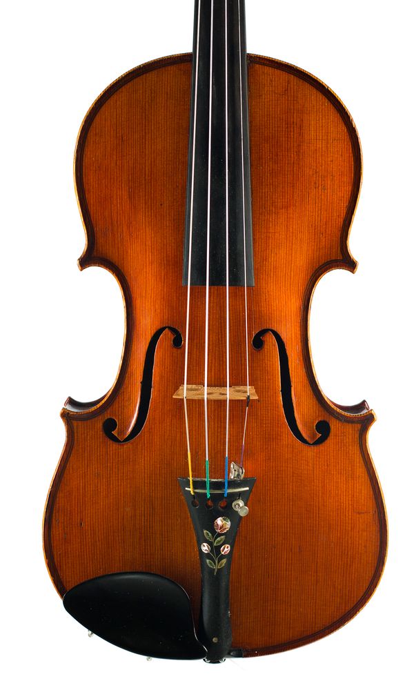 A violin, labelled Copy Stradivarius von Dölling dem Jùngeren