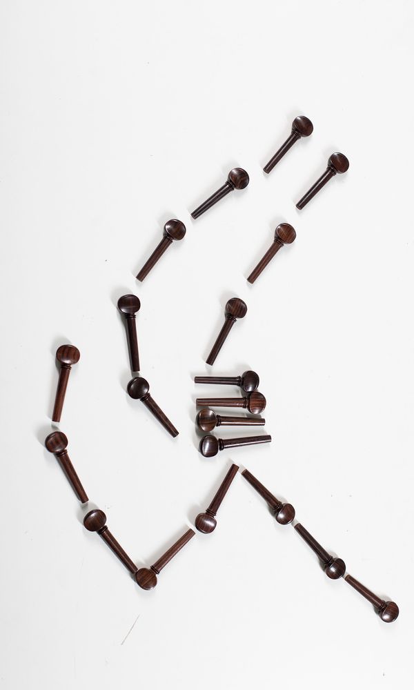 Thirteen sets of four viola Swiss-style pegs, rosewood