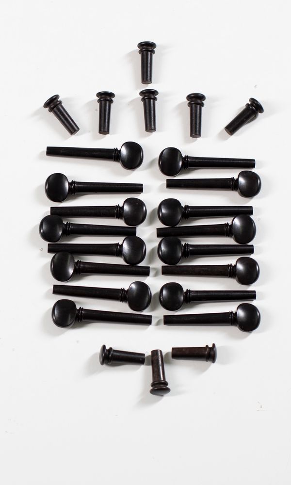 Nine sets of four viola Swiss-style pegs and nine endpins, ebony