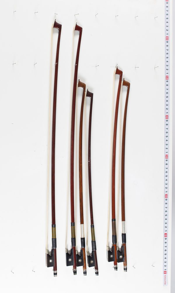 Six child's violin bows, varying lengths