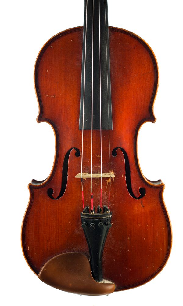 A violin labelled The Apollo over 100 years old