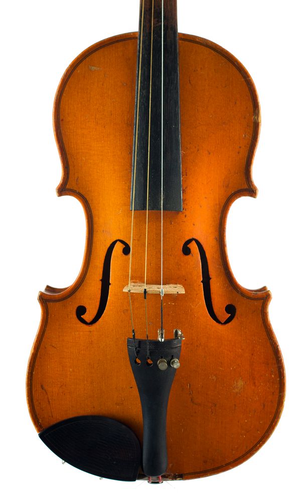 A small violin labelled The London Violin Co., Ltd