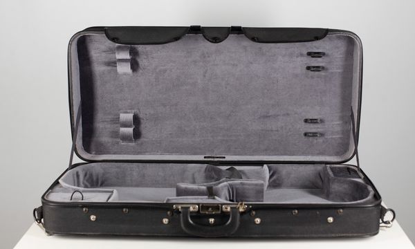 A double violin and viola case branded Chambord