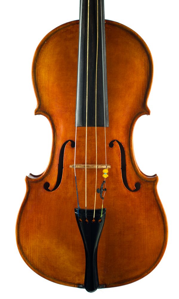 A violin, labelled Ewald Bruckner