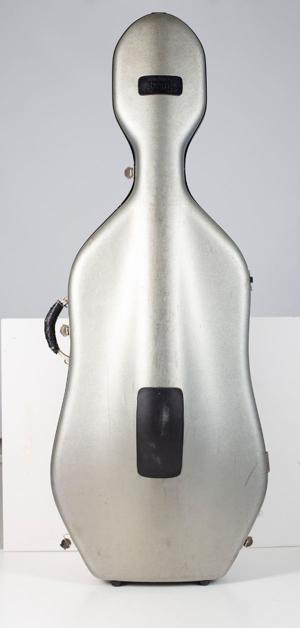 A cello case, branded BAM