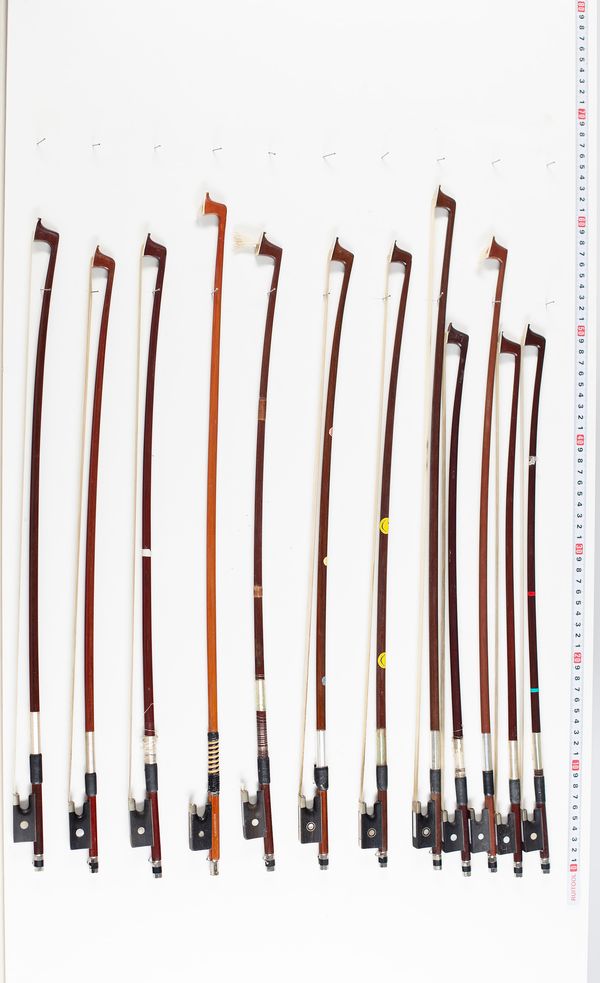 Fifteen child violin bows, varying lengths