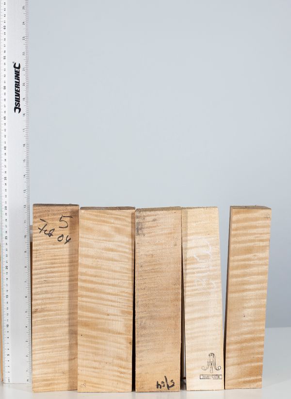 Five violin scroll blocks, maple