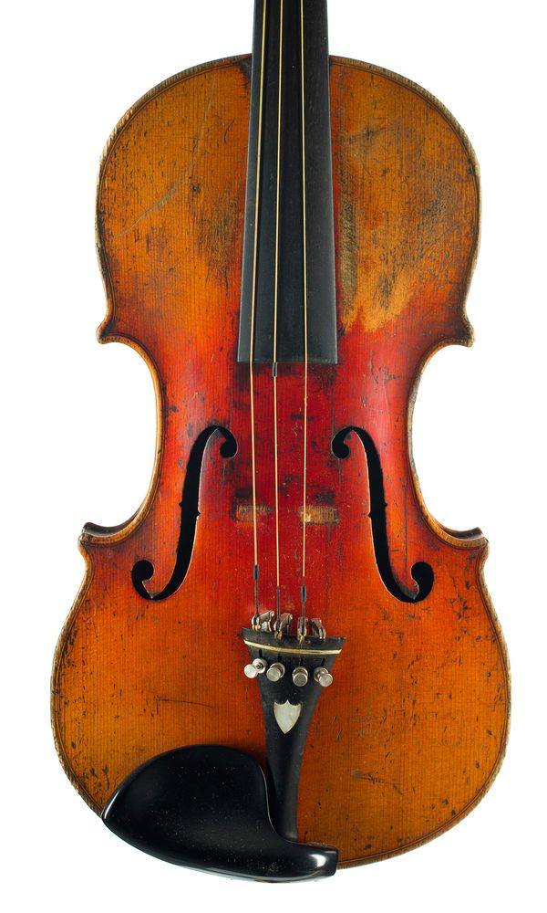 A violin, labelled Copy of Joseph Guarnerius 1920 over 100 years old