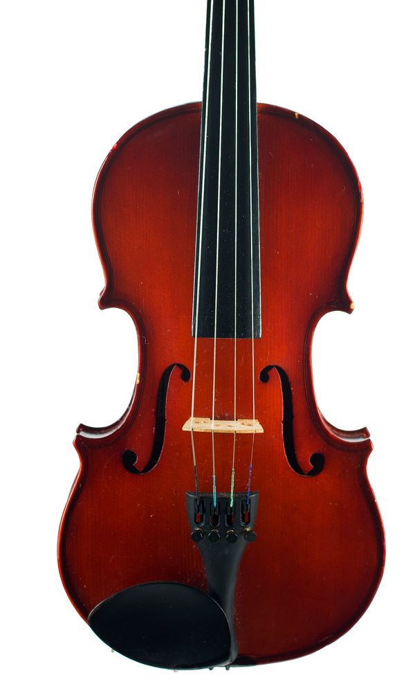 A quarter size violin labelled Primavera