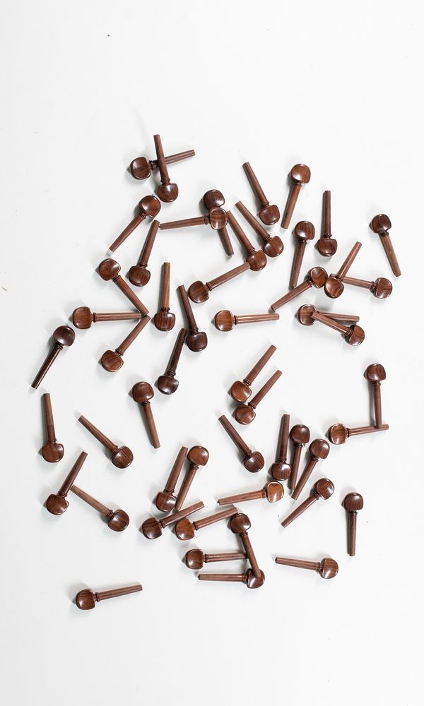 Fifty two violin pegs