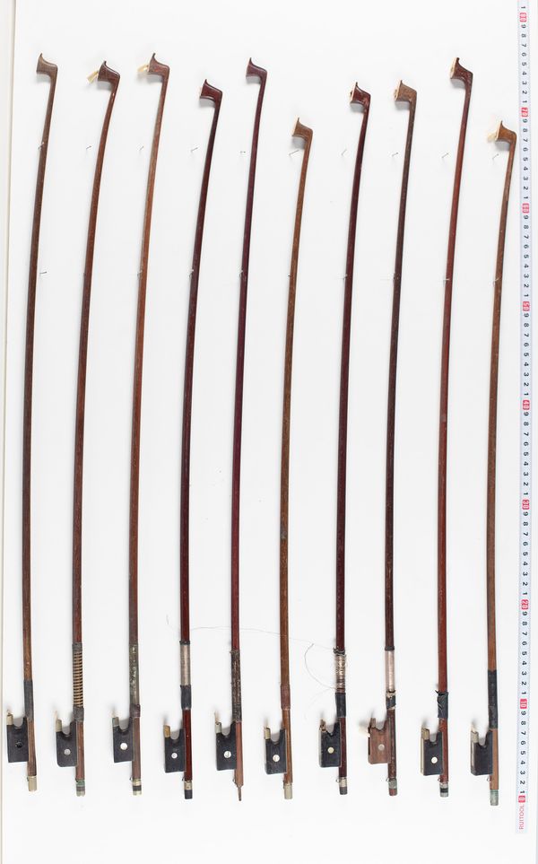 Seventeen violin bows, sixteen cello bows and two sticks, various lengths