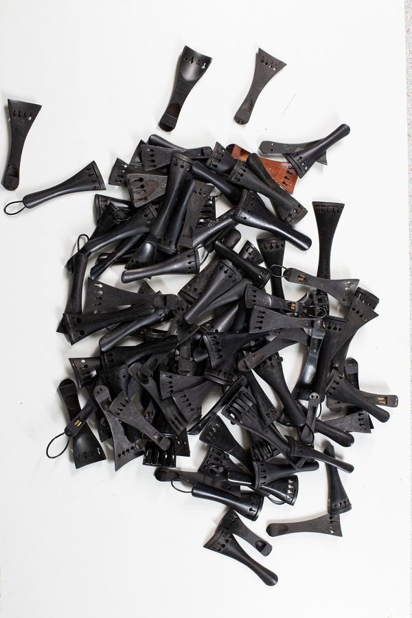 One hundred tailpieces, various sizes