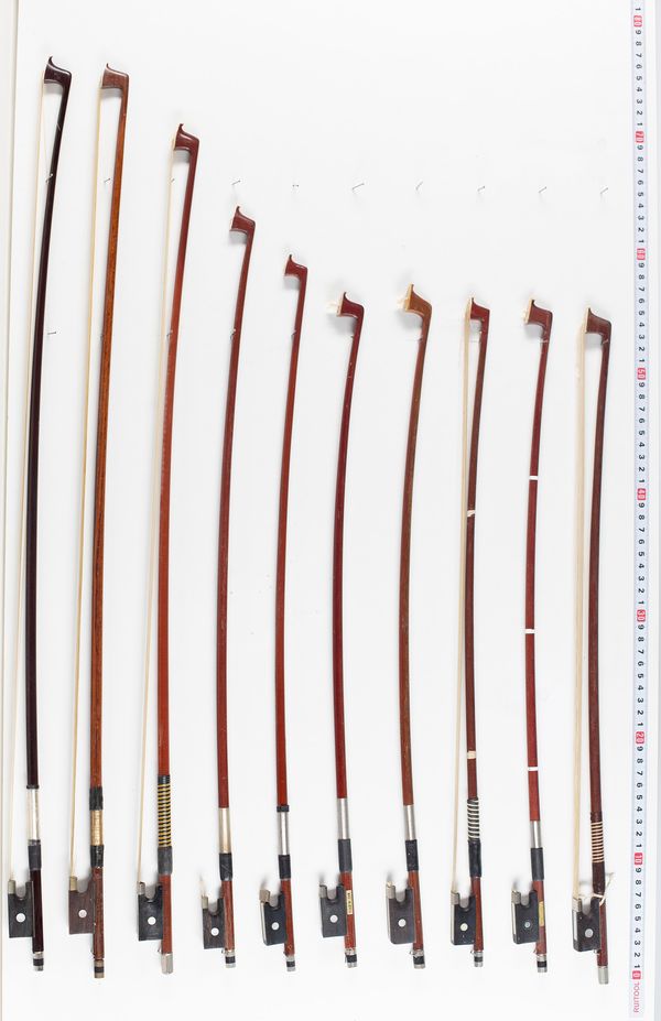Twenty three violin bows, seven cello bows and two sticks, various lengths