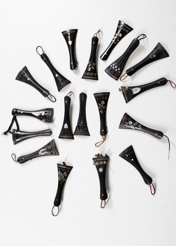 Eighteen decorative tailpieces, various sizes