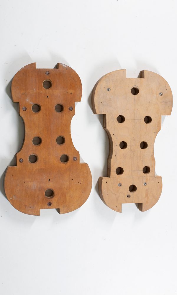 One viola and two violin moulds