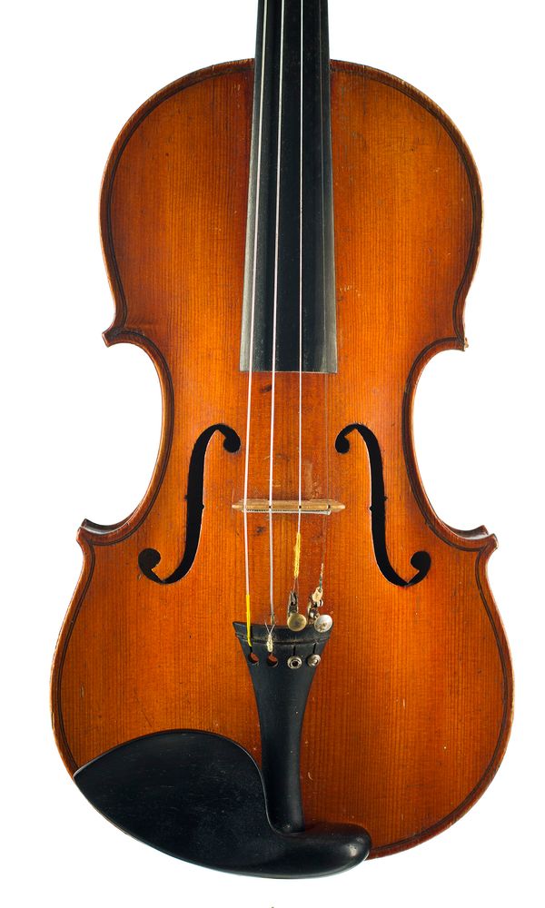 A violin, labelled Modele d'apres Antonius Stradivarius