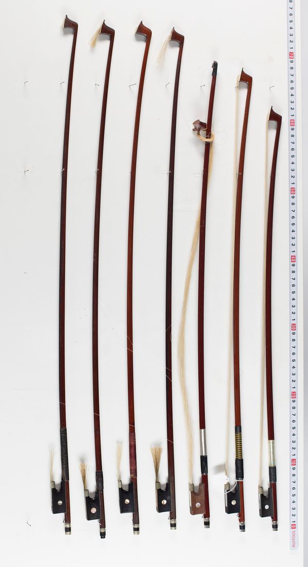 Six violin bows, varying lengths