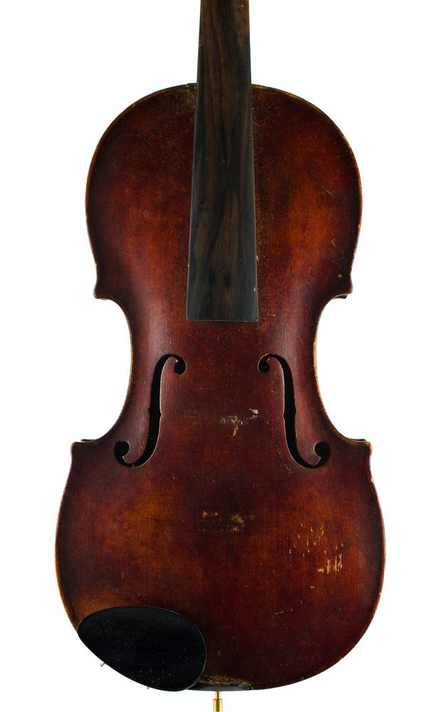 A violin, labelled Cesare Tonossi