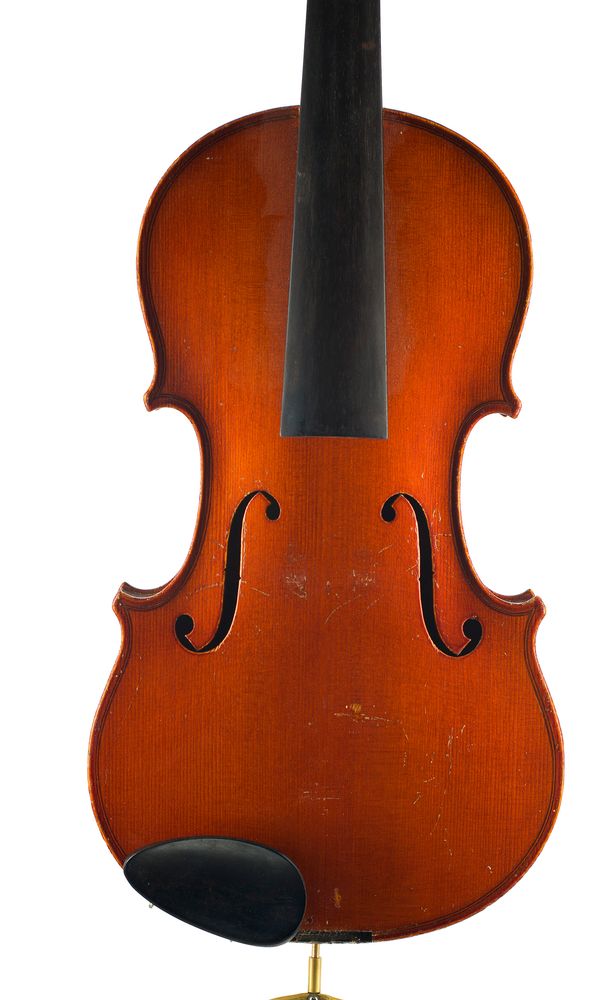 A violin, labelled Max Millant