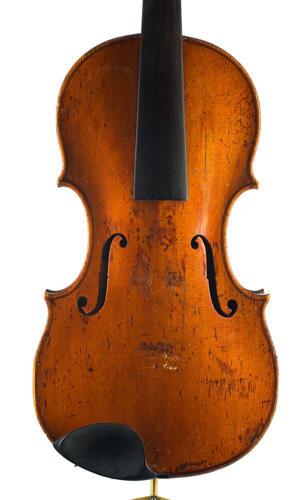 A violin, with repairer's label, 1900, Over 100 years old.