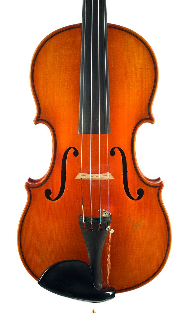 A violin, labelled Julius A. Hubicka