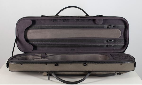 A violin case branded Pedi