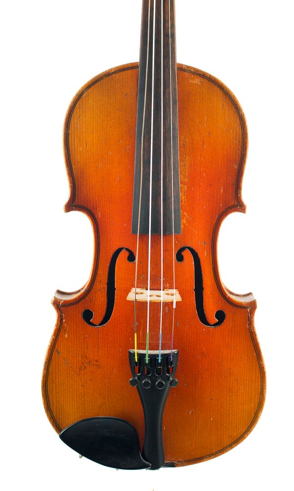 A three-quarter sized violin, labelled Copy of Antonius Stradivarius