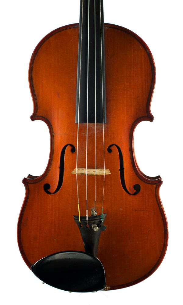 A violin, labelled Charles Brugére