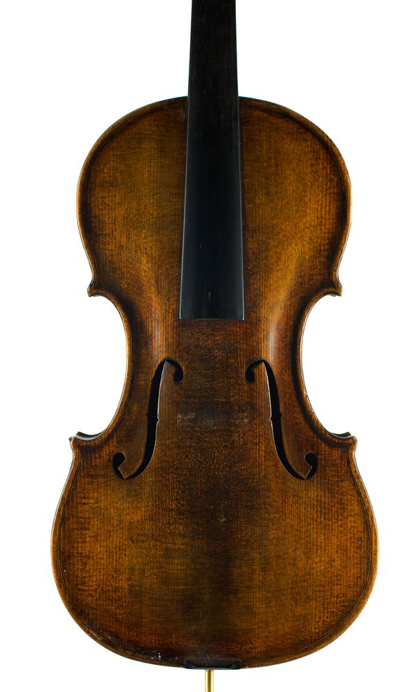 A violin, labelled Copy of Stradivarius Made by G. Patrick