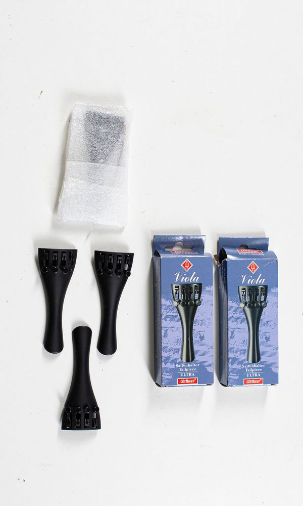 Six viola tailpieces branded Saitenhalter