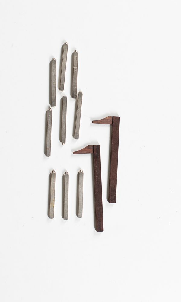 Two elevation gauges and number stamps