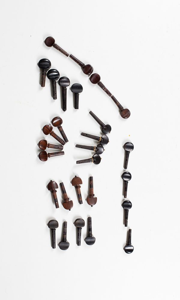 Seven sets of violin pegs