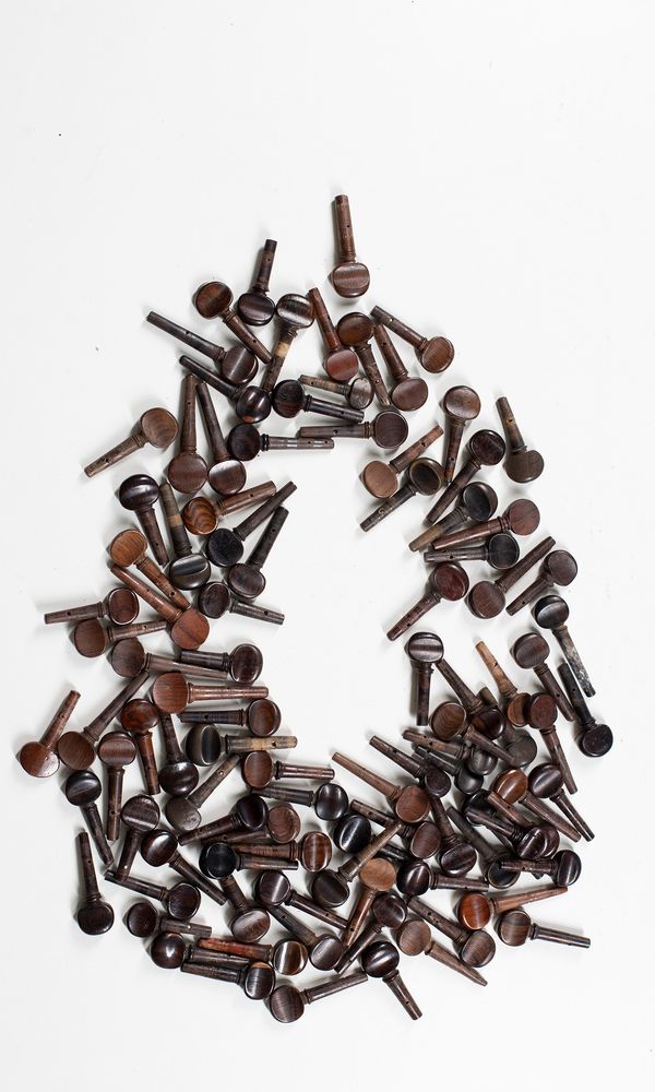 One hundred violin pegs, various sizes