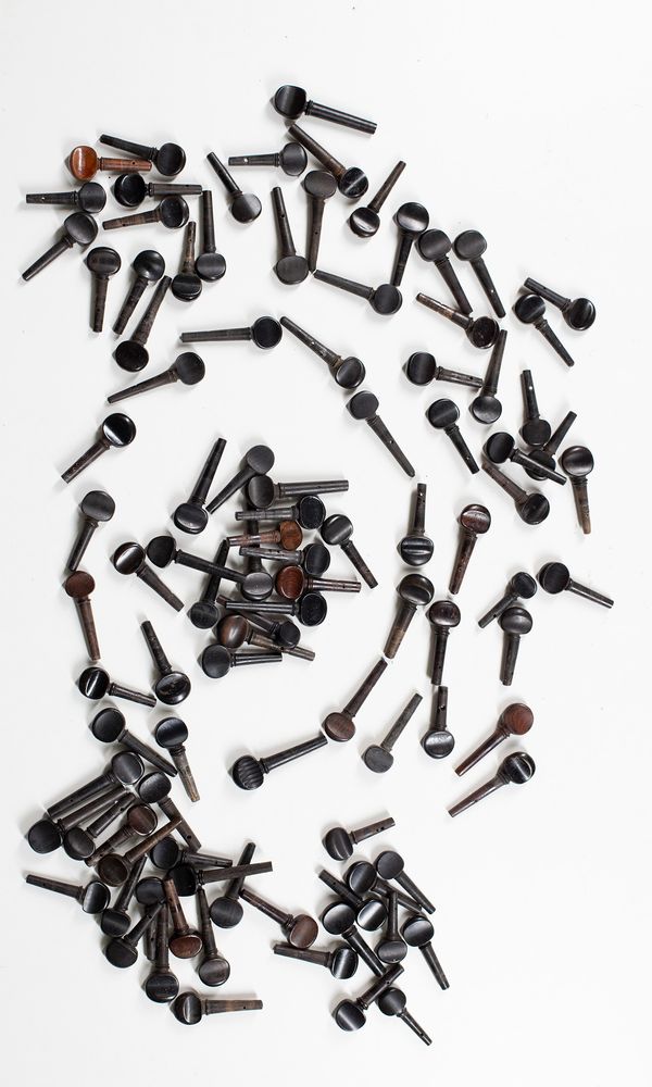 One hundred violin pegs, various sizes